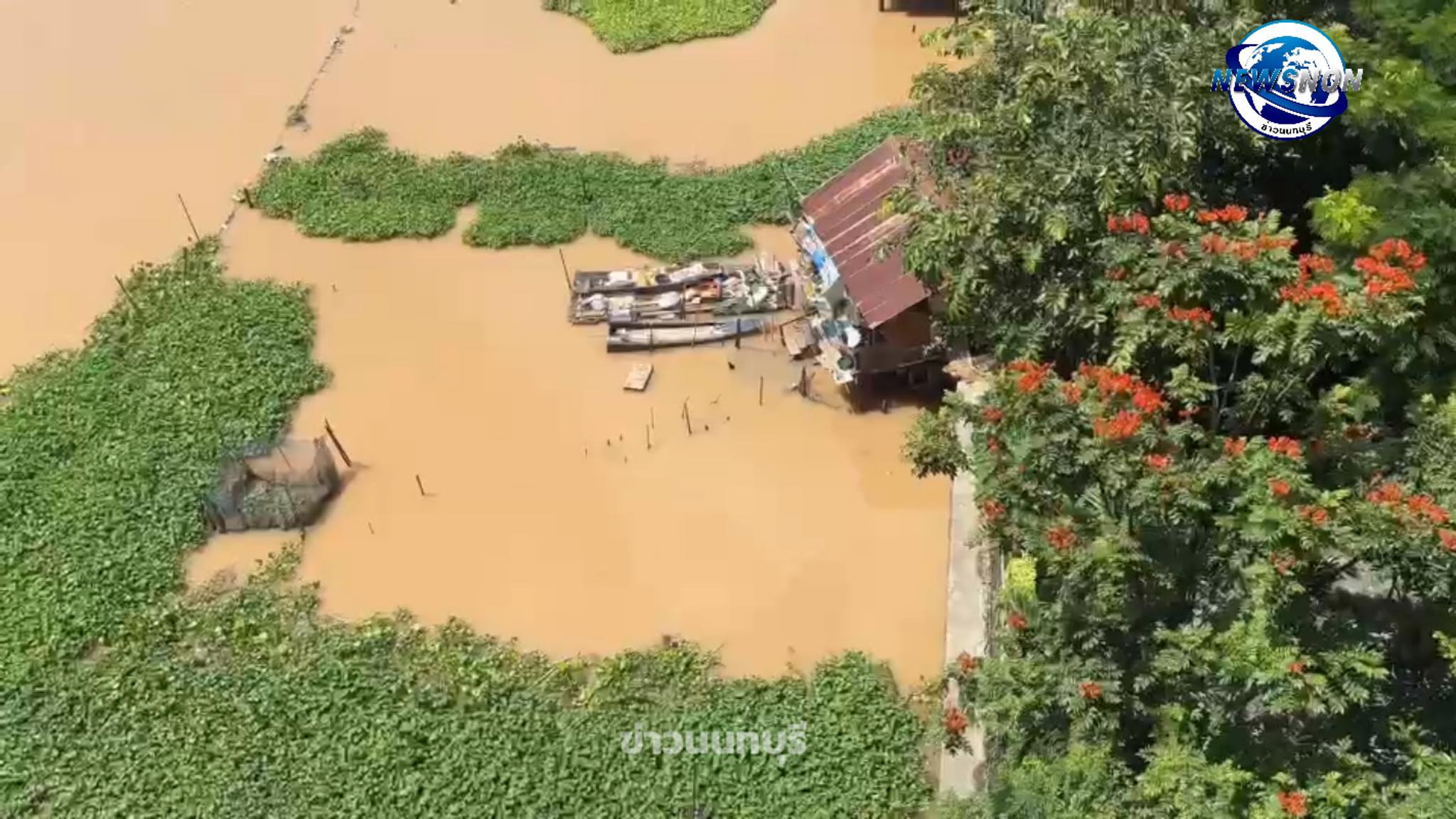 man motorcycle railing river