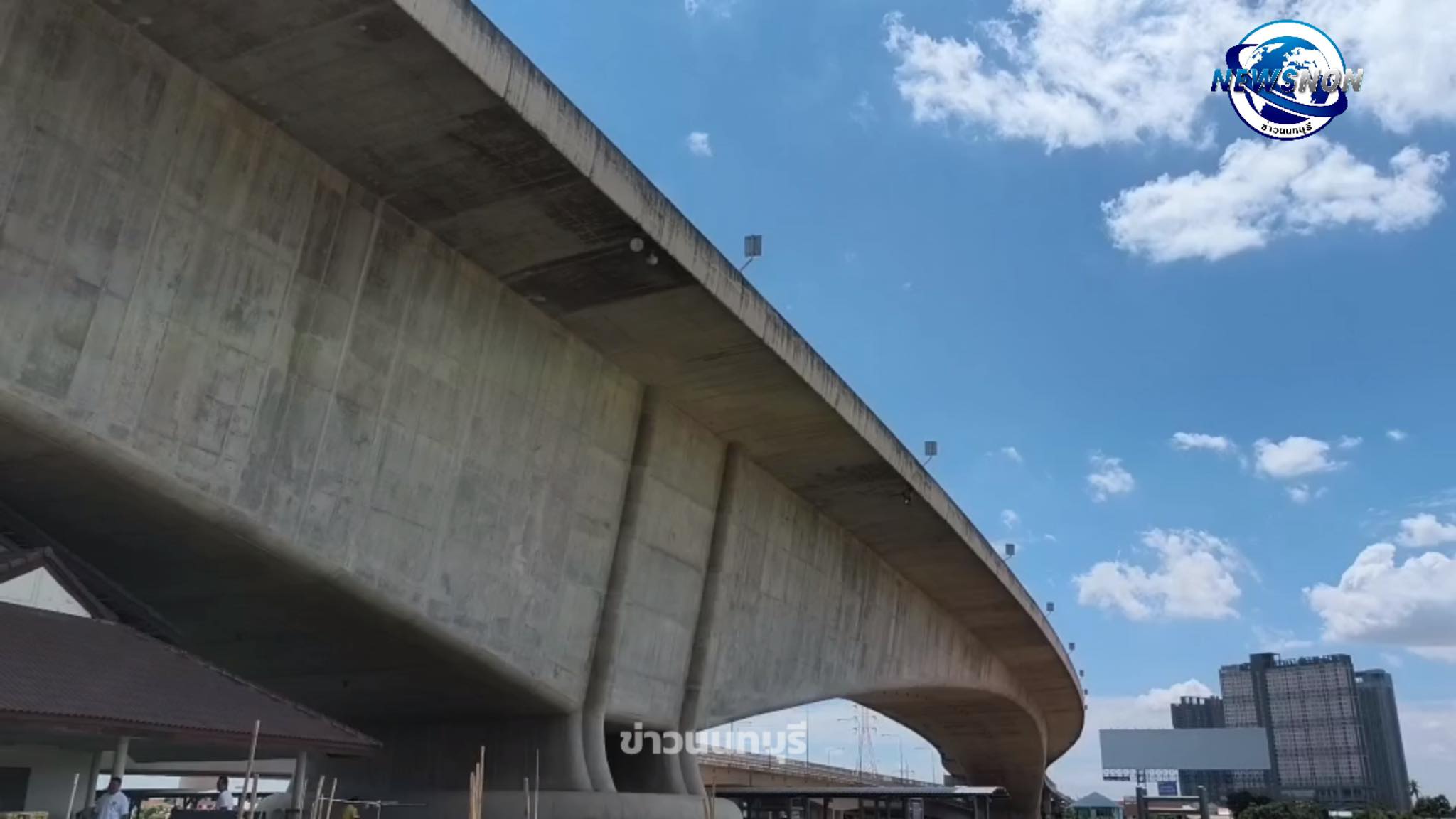 man motorcycle railing river