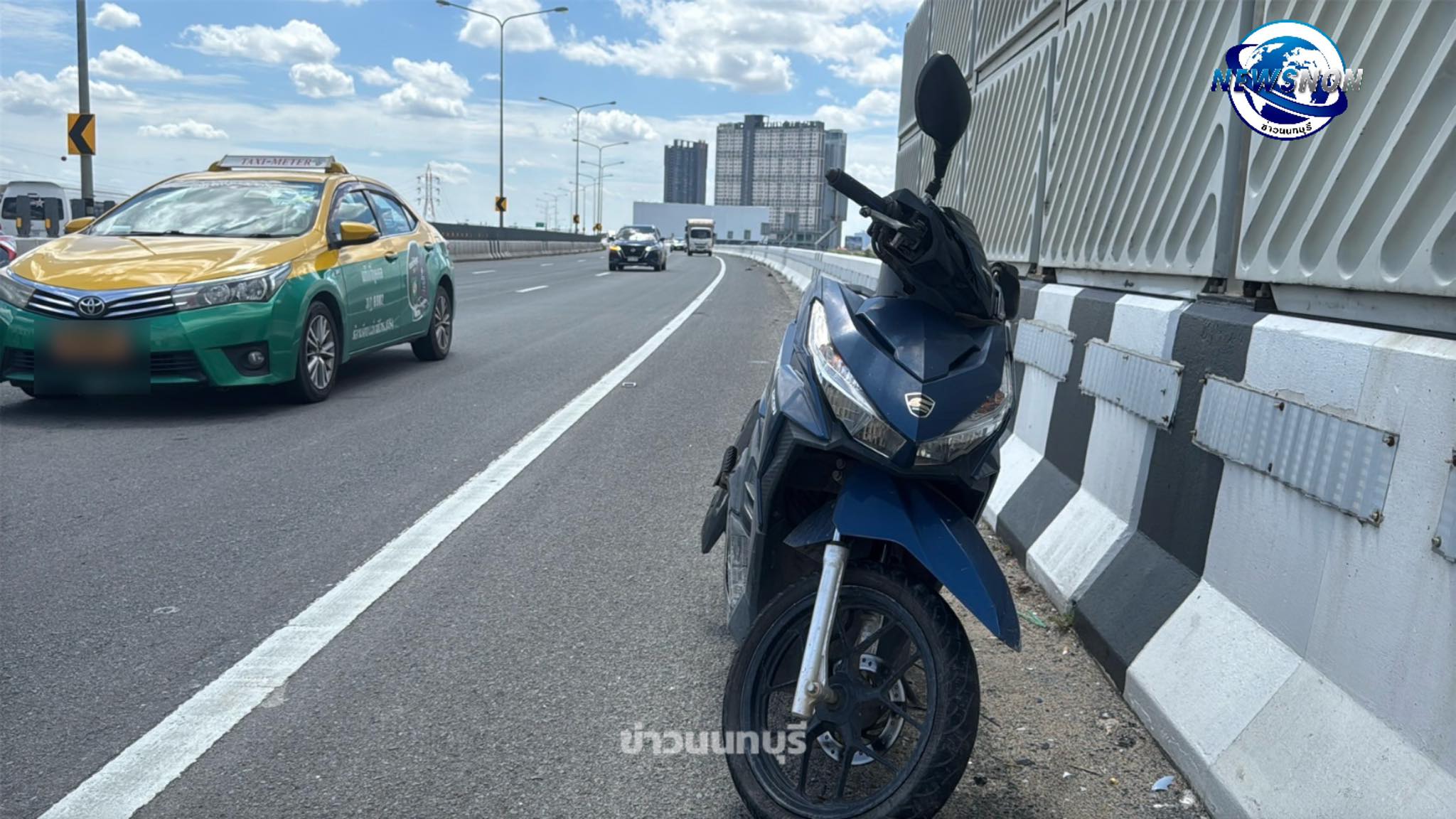 man motorcycle railing river