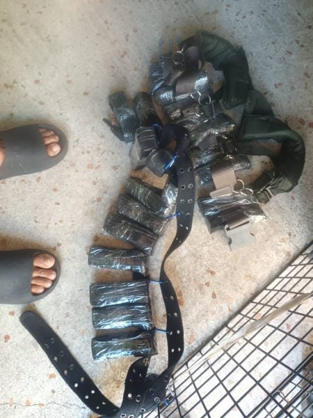 man running bomb vest