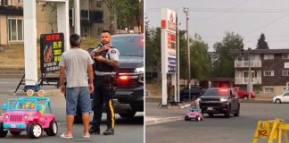 man driving toy jeep