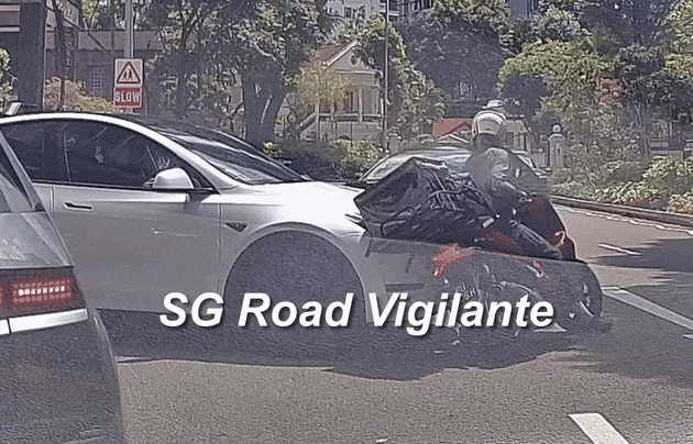 tesla motorcyclist orchard