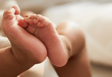touching baby