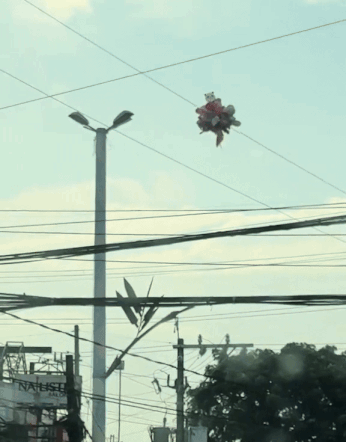 elderly vendor balloons