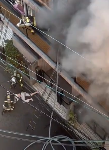 woman firefighter ladder