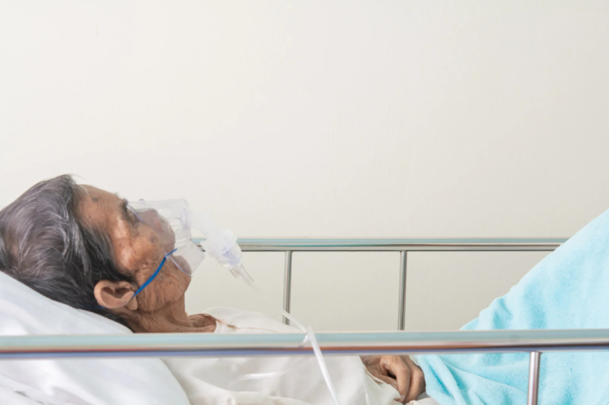 bedridden elderly woman