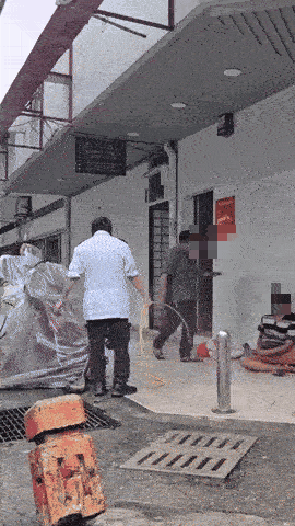 homeless man kicking water