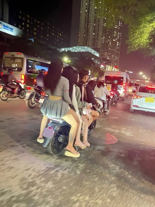 motorcyclist passengers helmets photo