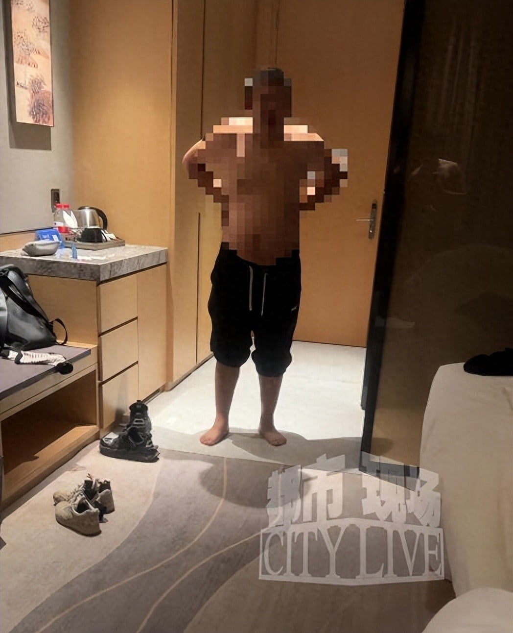 half-naked man hotel room break-in