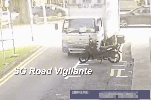 lorry parked motorcycle