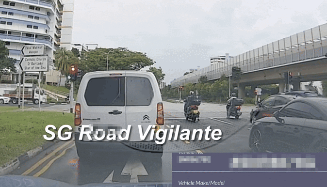 motorcyclist car red light