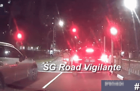 motorcyclist bmw red light