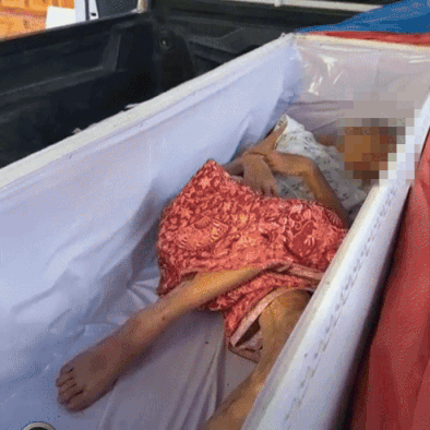 woman found alive coffin cremation