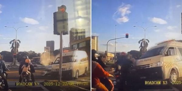 Ambulance crashes motorists red light