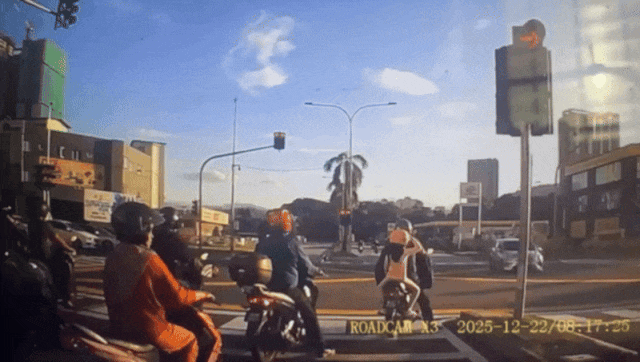 Ambulance crashes motorists red light