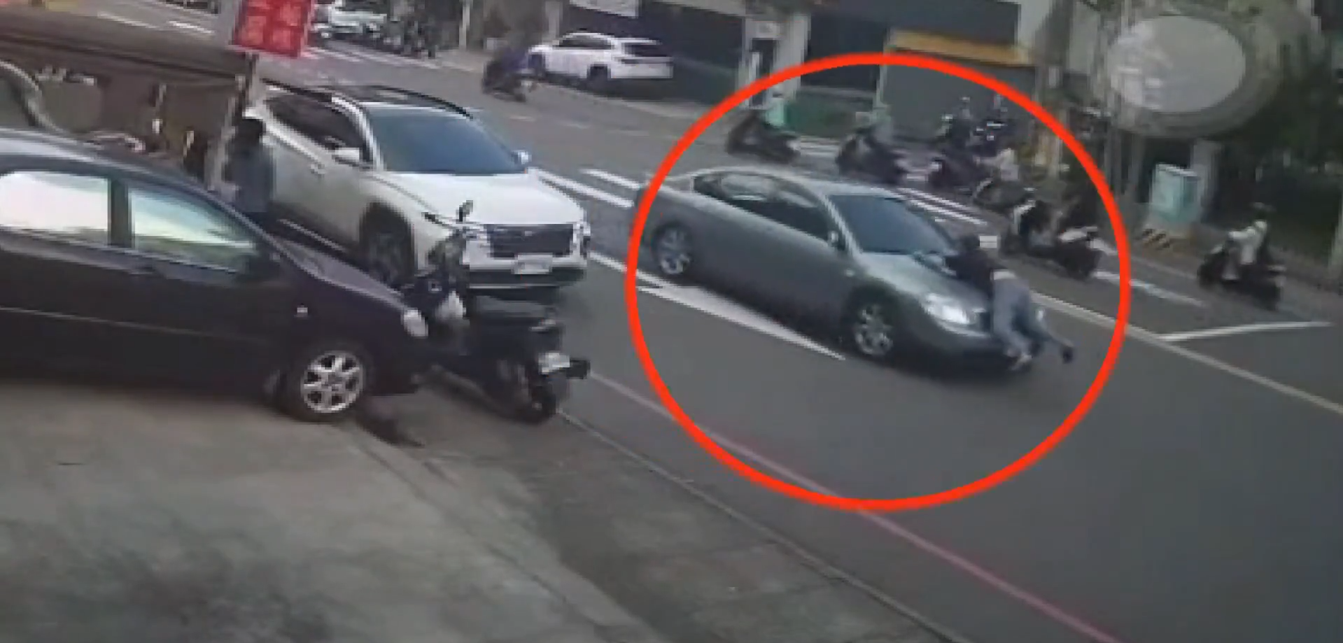 woman clung car