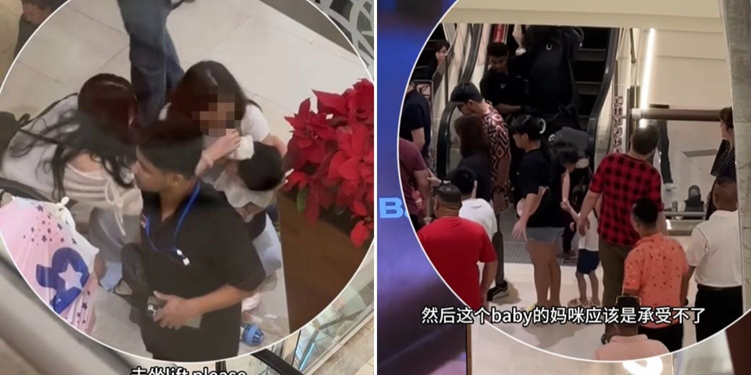 boy stroller falls escalator