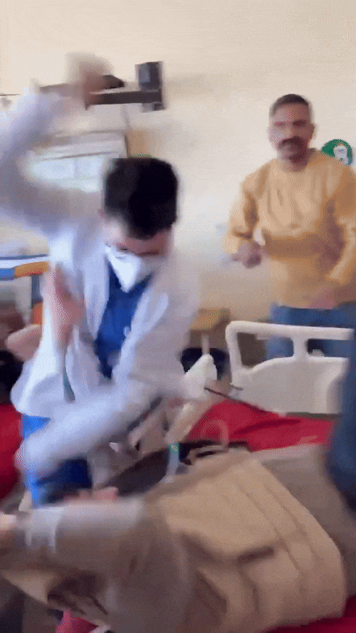 doctor punching patient