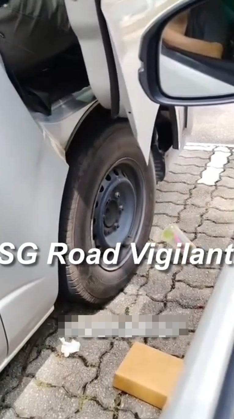 man littering malaysia