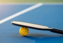 man falling floor pickleball