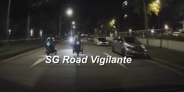 3 PMD riders cruise down Woodlands road, 1 overtakes car going 50km/h