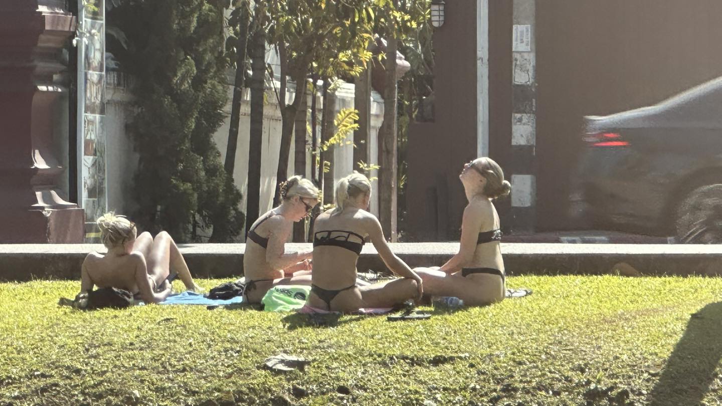tourists bikinis thailand temple