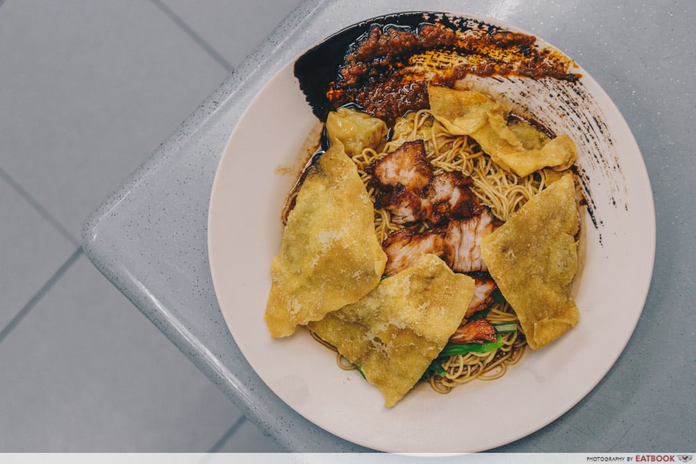 woman chilli wonton noodles