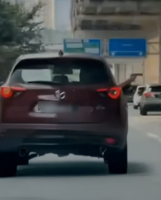 man pointing toy gun