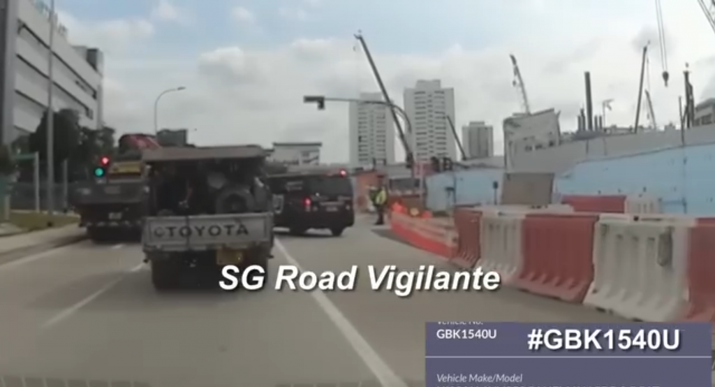 van blocking both sides of traffic