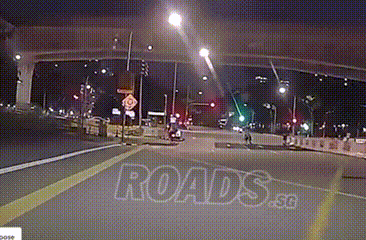 cyclist swerving from first to last lane on the road