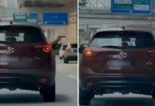 man pointing toy gun