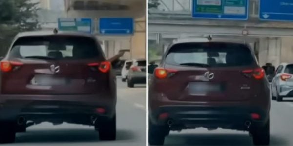 man pointing toy gun