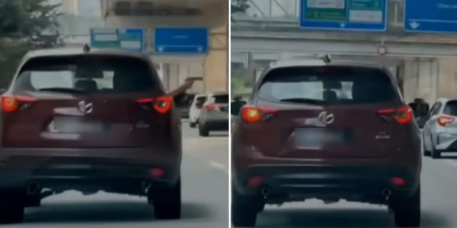 man pointing toy gun