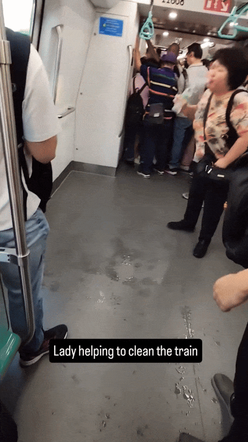 woman spitting water charged