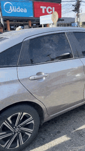 passersby break man car hammer