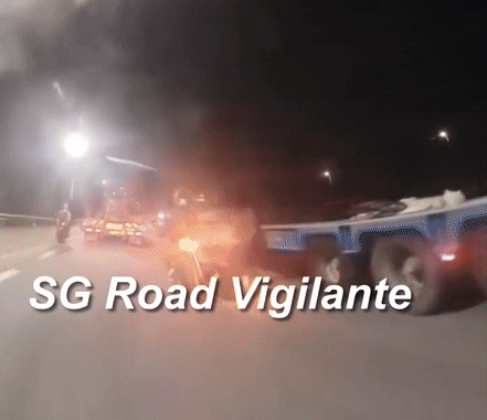 motorcyclist truck wheels aye