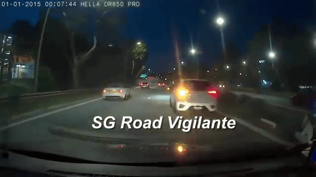 white car drive away