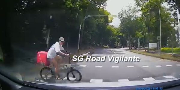 Rider almost gets hit by car