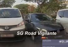 car squeezing between 2 other vehicles