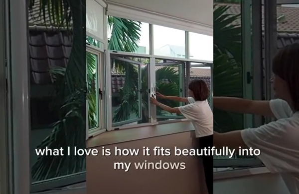 woman opening windows