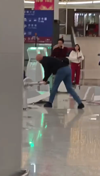 man check-in kiosks airport