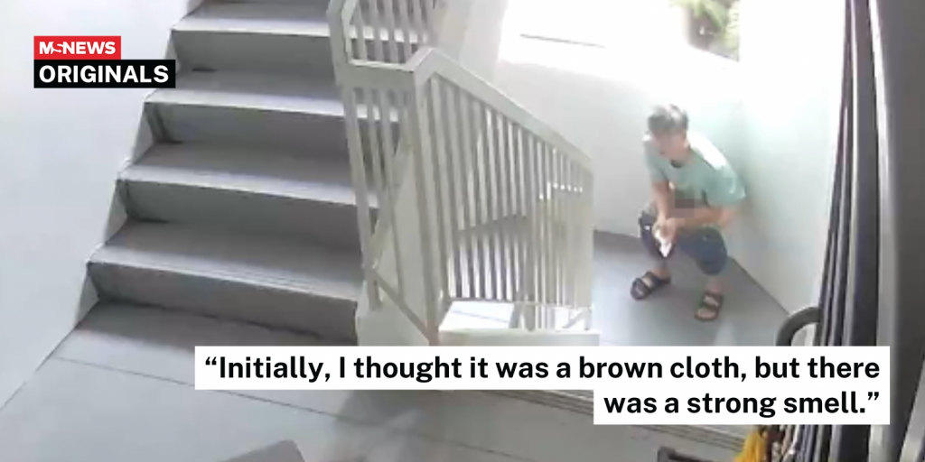 man taking a dump at hdb staircase landing