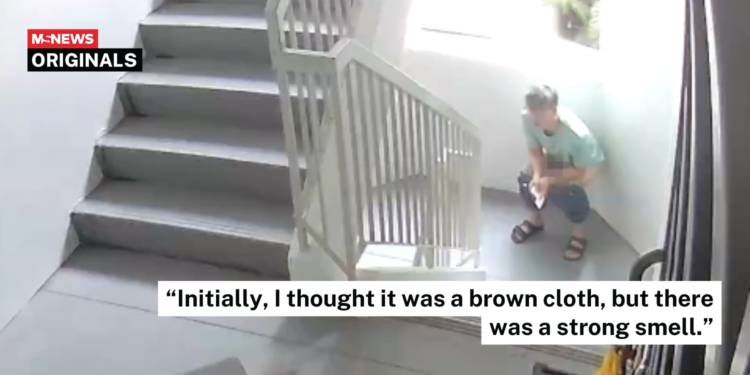 man taking a dump at hdb staircase landing
