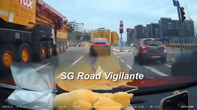 mobile crane at traffic junction