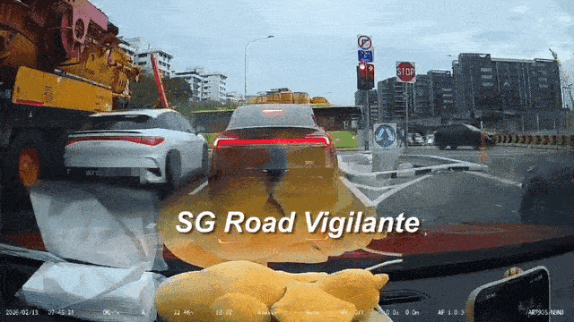 car squeeze beside mobile crane