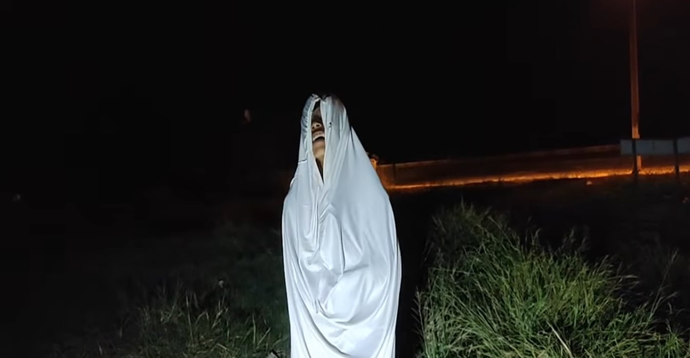 ghost man white cloth caught