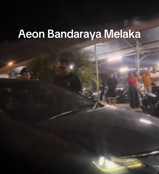 man chases woman knife parking lot