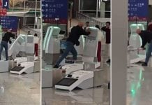 man check-in kiosks airport