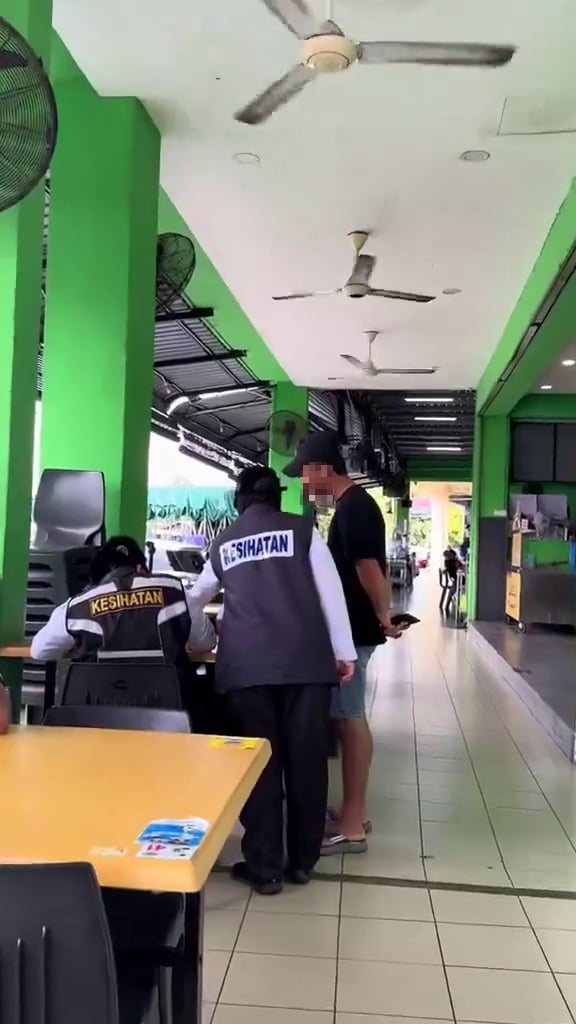 man smoking traffic violations moh