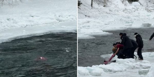 mother daughter freezing river